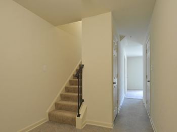 View from the bottom of the stairs in a house